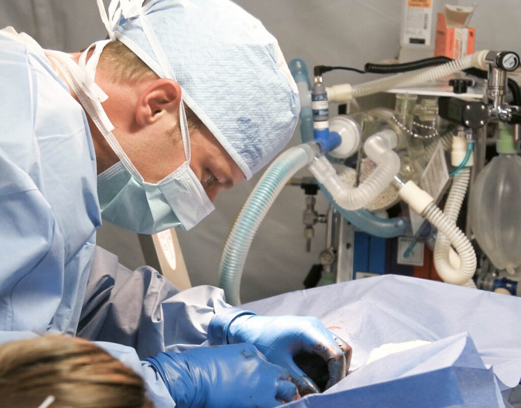 Surgeon performing surgery in operating room